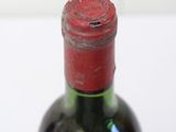 a bottle of wine that is sitting on a table