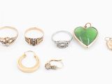 an assortment of various rings and rings on a white surface