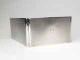 a silver box that is sitting on a white surface