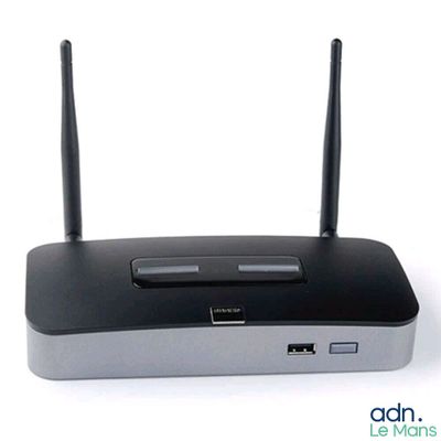 an image of a close up of a wireless device on a white surface