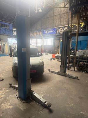 an image of a car being worked on in a garage