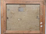 an old picture of a picture frame with a piece of fabric on it