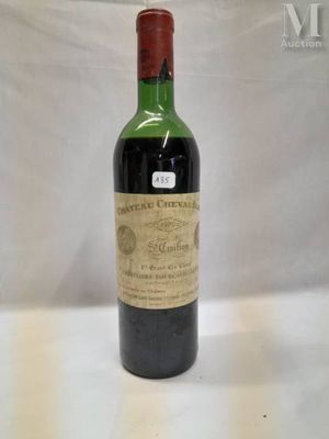 a bottle of wine that is sitting on a table