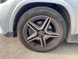 a close up of a tire on a car ' s rim