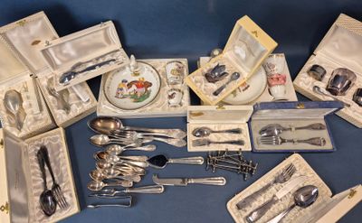 many different types of silverware on a table