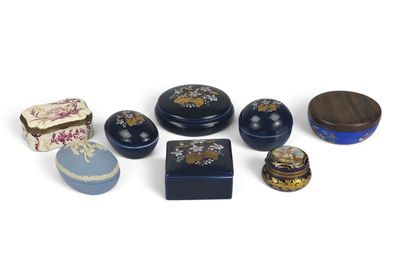 many different types of boxes and containers on a white surface