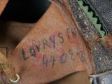a close up of a shoe with writing on it