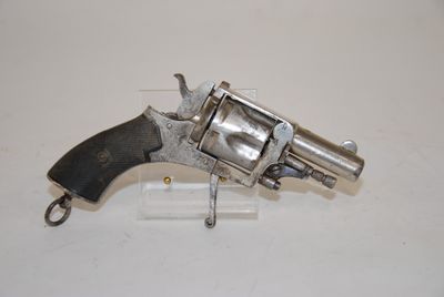 an old gun that is sitting on top of a table