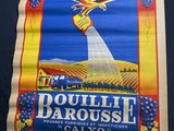a large poster of a bird flying over a field