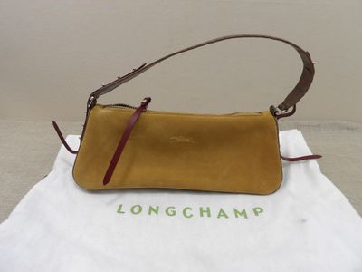 Sac à main Longchamp en cuir moutarde avec une bandoulière en cuir marron