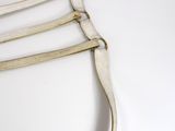 a leather strap that is attached to the back of a horse