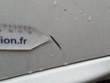 a sticker on the side of a car that says caution fr