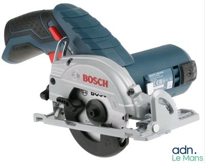 a close up of a circular saw on a white background