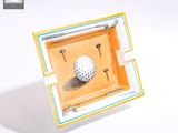 a picture of a golf ball inside of a box