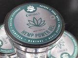 a stack of hemp power tins sitting on top of each other