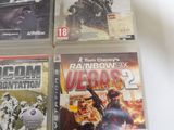 three video game cases of call of duty, rainbow six, and call of duty