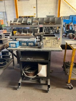 a picture of a workbench with a lot of tools on it