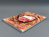 a book that has a picture of a plate of food on it