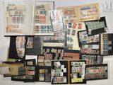 many different types of stamps on display in a display case