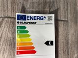 a close up of an energy label on a wooden surface