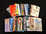 many credit cards sitting next to each other on a table