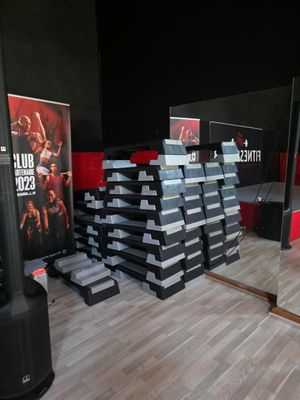 a lot of boxes stacked on top of each other on the floor