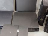 many different types of video game consoles on the table