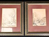 deux tableaux encadrés accrochés au mur