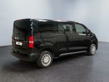 a picture of a black van parked in a room