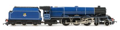 a toy train that is sitting on a white surface
