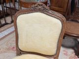 a chair that is sitting in the middle of a room
