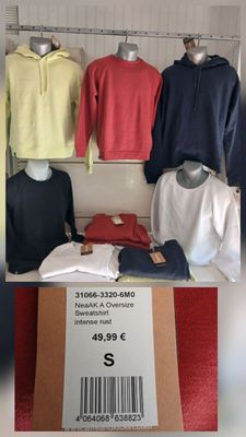 a lot of clothing on display in a store