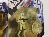 star wars action figures sit on top of each other on a table