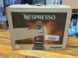 a box of nespresso coffee sitting on a table