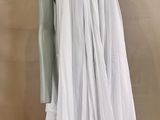a mannequin wearing a white dress on a mannequin mannequin