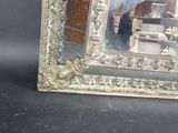 a picture of a mirror that is on a table