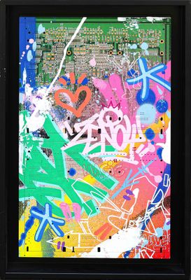 framed picture of colorful graffiti on a wall in a black frame