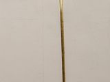 brass floor lamp with a marble base and a white marble base