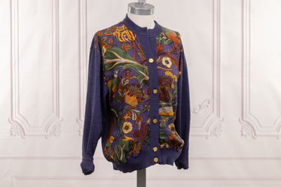 an image of a mannequin mannequin with a colorful jacket on it