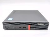 the back view of a small computer with a keyboard and mouse