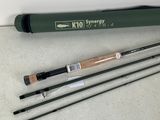 a group of fishing rods sitting on top of a table