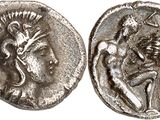 une pièce de monnaie en argent portant l'image d'un homme et d'une femme