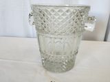 a glass vase that is sitting on a table