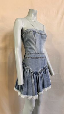 denim dress with ruffles on mannequin base