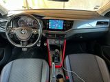 the interior of a car with a steering control and a dash board