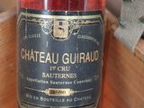 a bottle of wine that is sitting on a table