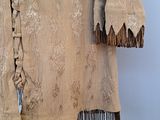 an image of a jacket with fringes on it