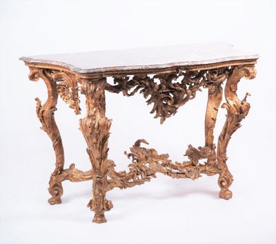 a table that has a marble top on it