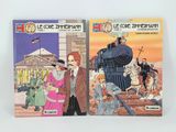 two books of comics are sitting on top of each other