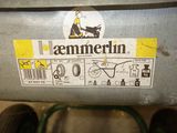 a sticker on the back of a lawn mower